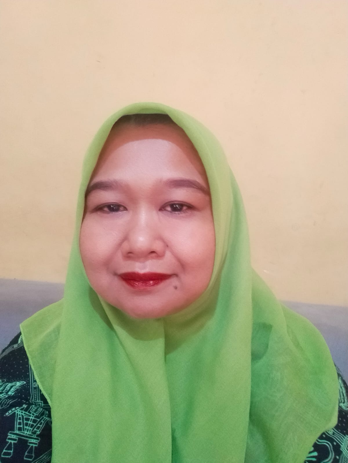 SUHARTINI